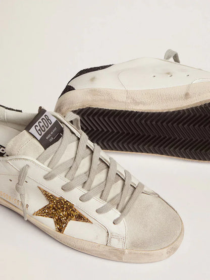 Super-Star femme en cuir nappa avec étoile à paillettes dorées et contrefort à paillettes noires